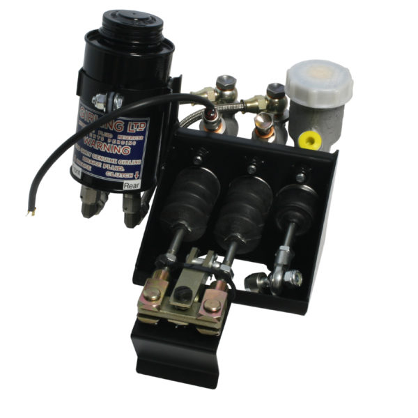 An air suspension compressor kit, featuring a black compressor, three air bellows, and various brass fittings, all mounted on a metal platform.